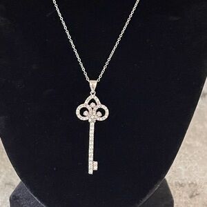 Bella Luce .69CTW Round Rhodium Plated, Sterling Silver Key Pendant 18" Chain